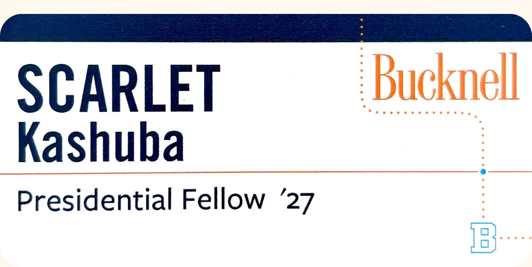 Scarlet's Bucknell name badge reading Scarlet Kashuba, Presidential Fellow '27